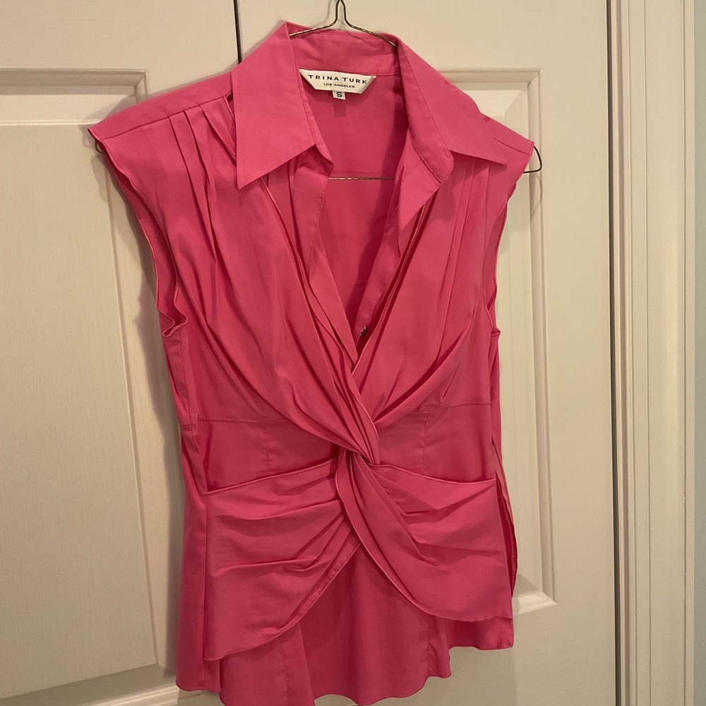 Trina Turk side-zip pink blouse.Twisted/knot front detail.